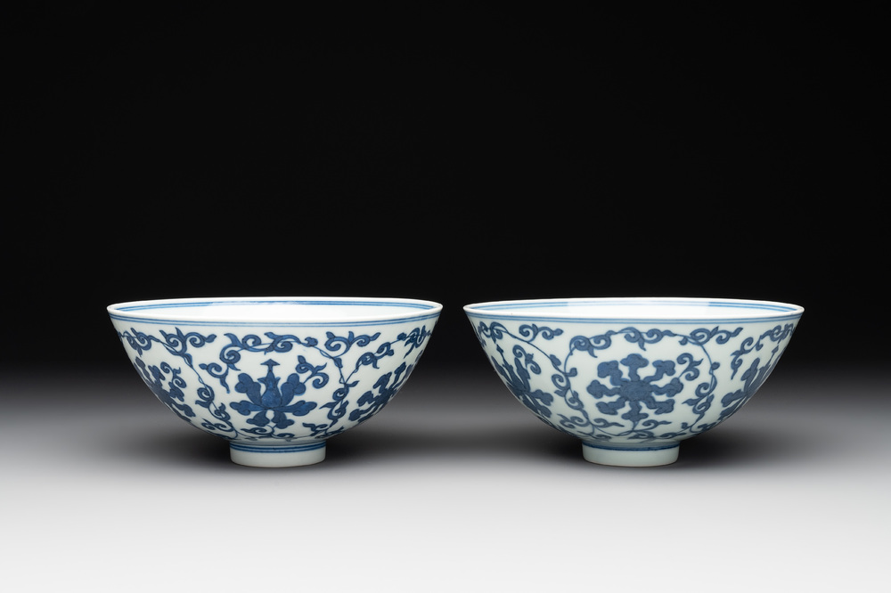 A pair of Chinese blue and white 'lotus scroll' bowls, Yongzheng mark and possibly of the period