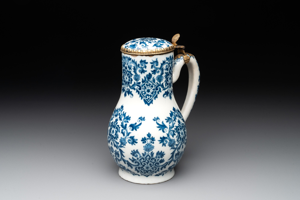 A fine blue and white Dutch Delft gilt-silver-mounted ewer and cover in the style of Daniel Marot, ca. 1700