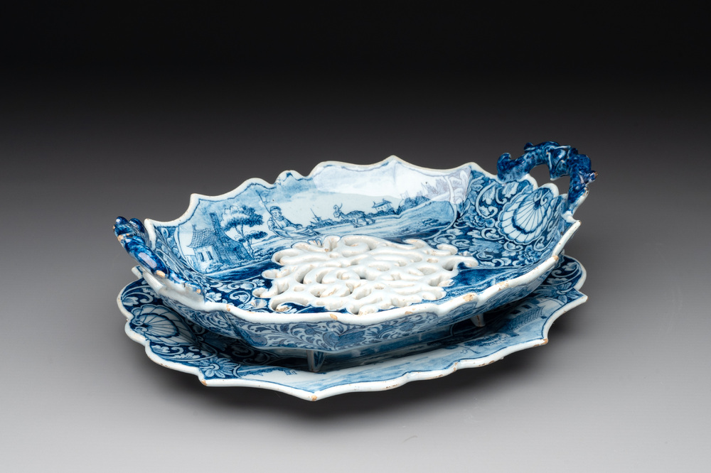 A blue and white Dutch Delft strainer on stand with fine landscapes, 18th C.