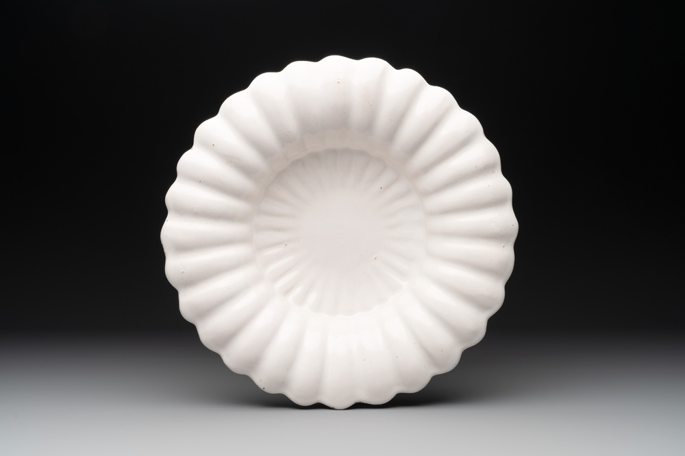 A fine white Dutch Delft gadrooned dish, 17th C.