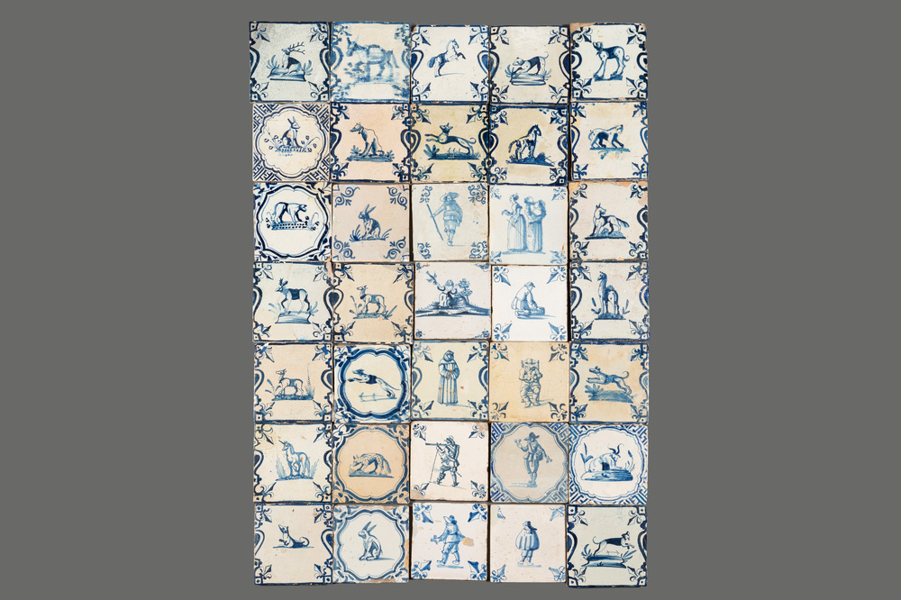 35 blue and white Dutch Delft tiles with figures and animals, 17/18th C.