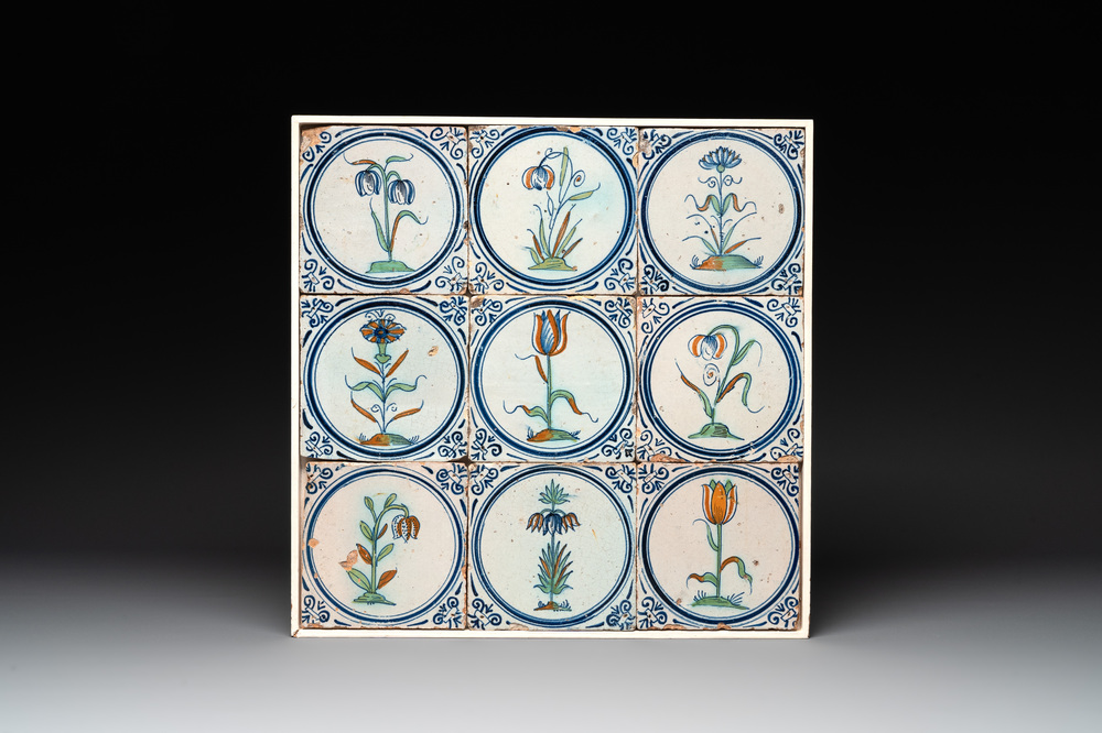 A field of nine polychrome Dutch Delft tiles with flowers, 17th C.