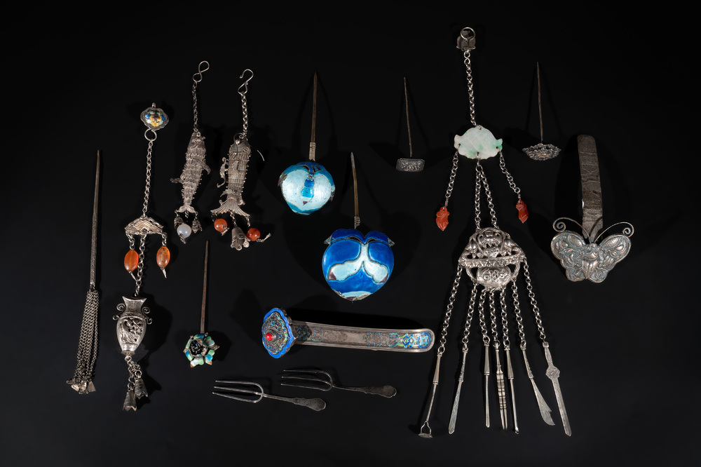 A collection of Chinese silver jewellery, some pieces adorned with enamel and precious stones, 19/20th C.