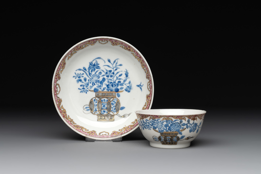 A Chinese gilt-decorated blue- and-puce-enamelled 'flower basket' cup and saucer, Qianlong