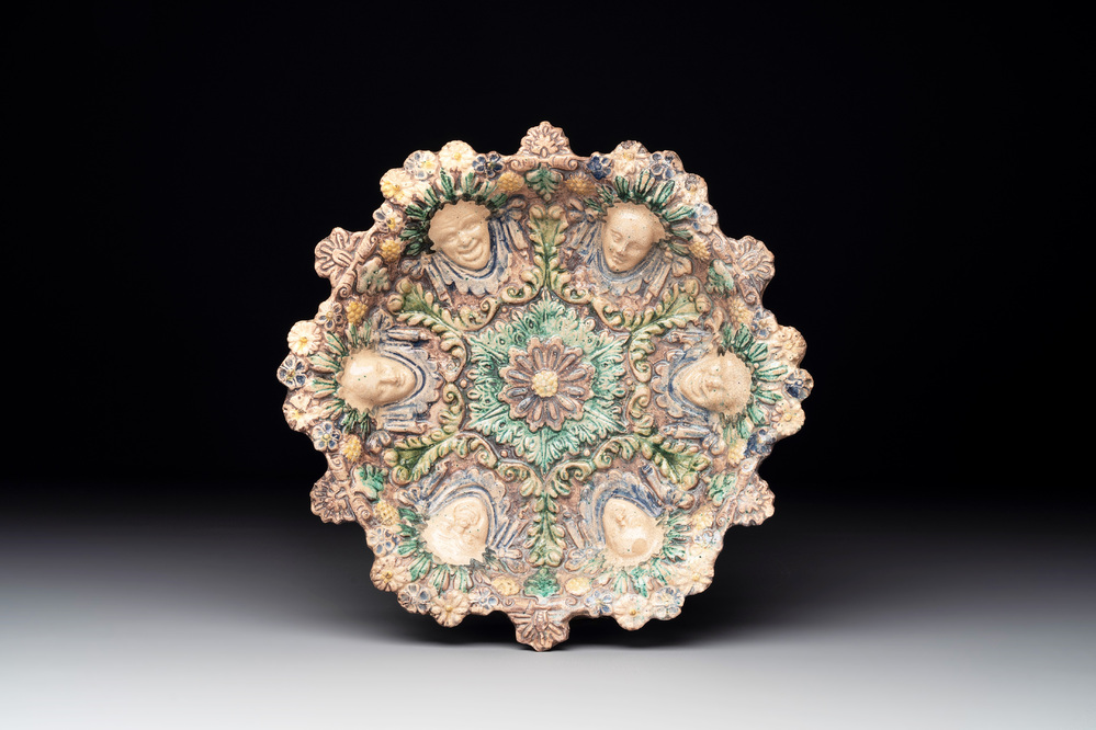 A French polychrome relief-moulded dish in the manner of Palissy, 17th C.