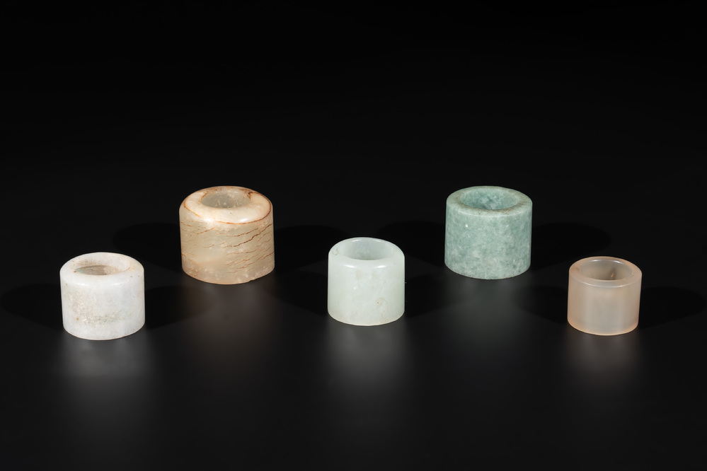 Five Chinese jade and agate archer's rings, Qing