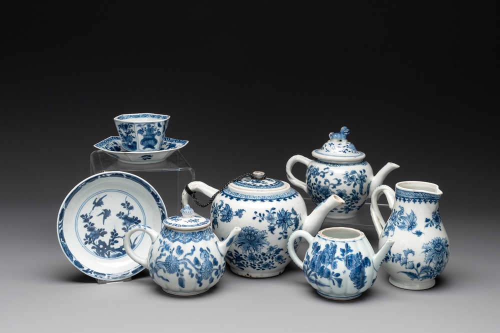 Four Chinese blue and white teapots, a milk jug, a cup and two saucers, Kangxi/Qianlong
