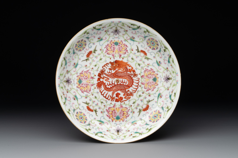 A Chinese iron-red-decorated famille rose 'dragon' plate, Guangxu mark, 19/20th C.