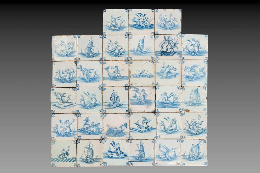 33 blue and white Dutch Delft tiles with sea creatures and ships, mostly Ghent, 17/18th C.
