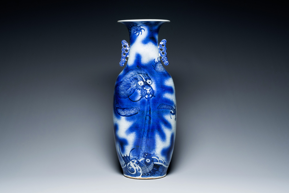 A Chinese blue and white 'dragon and carp' vase, 19th C.