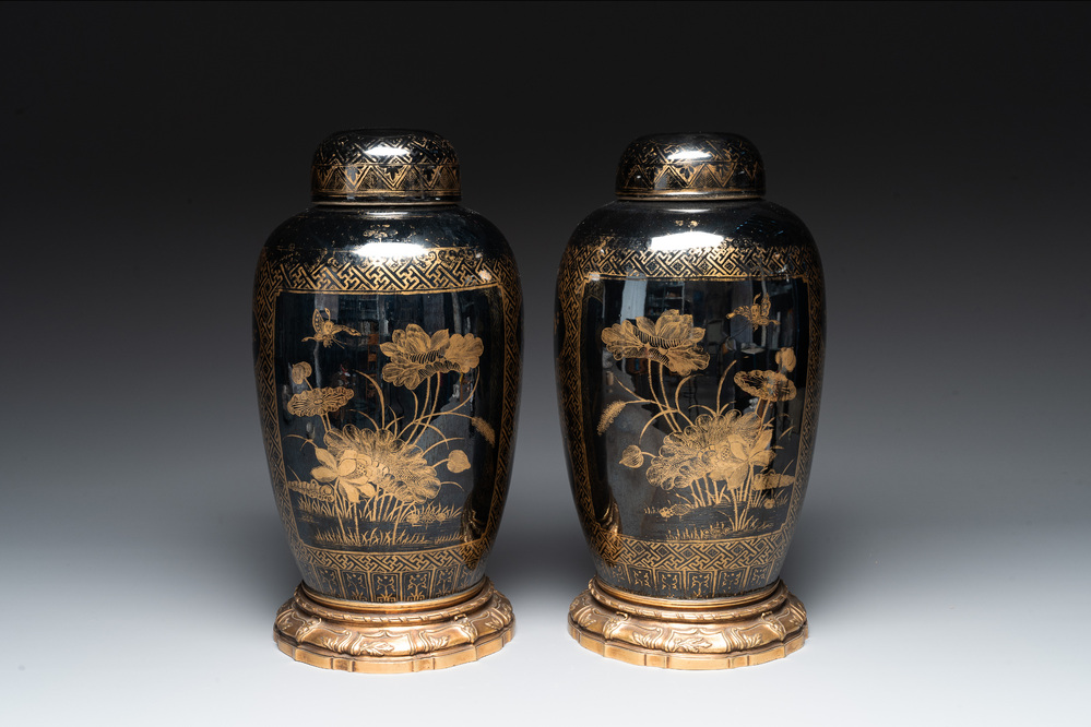 A pair of Chinese gilt-decorated mirror-black-glazed jars and covers on gilt bronze mounts, 19th C.