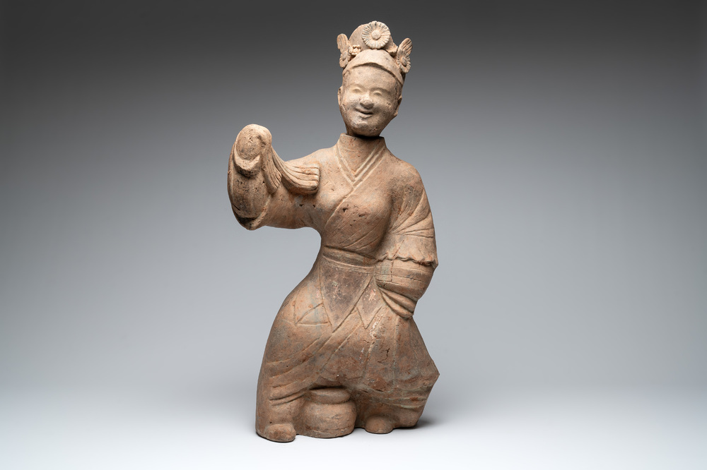A large Chinese terracotta sculpture of a dancer, possibly Han
