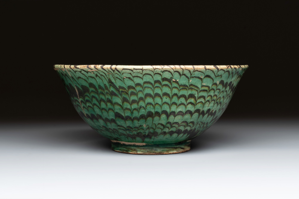 A Chinese green-glazed marbled bowl, probably Tang