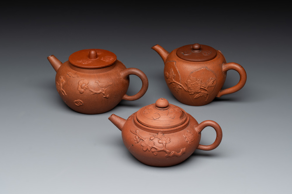 Three Chinese Yixing stoneware teapots and covers, 18th C.