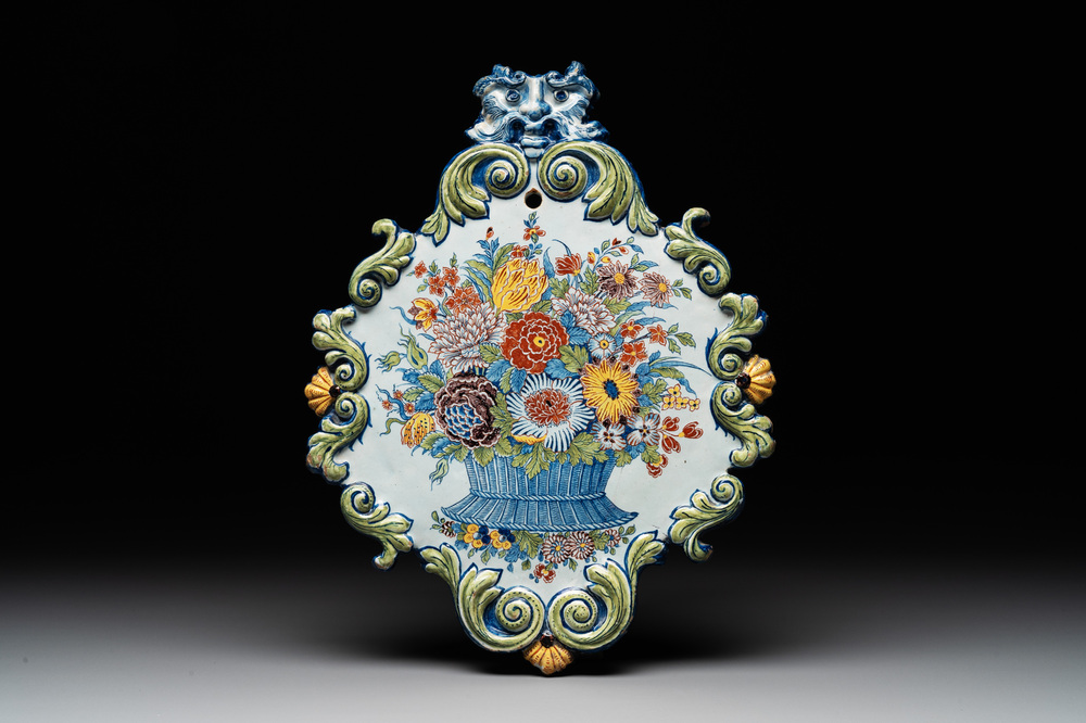A polychrome Dutch Delft 'flower basket' plaque, dated 1759