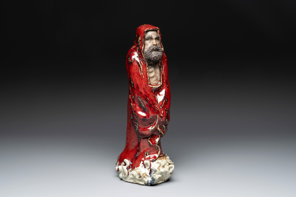 A Chinese Shiwan flamb&eacute;-glazed figure of a Luohan, Deng 邓 seal mark, dated 1927