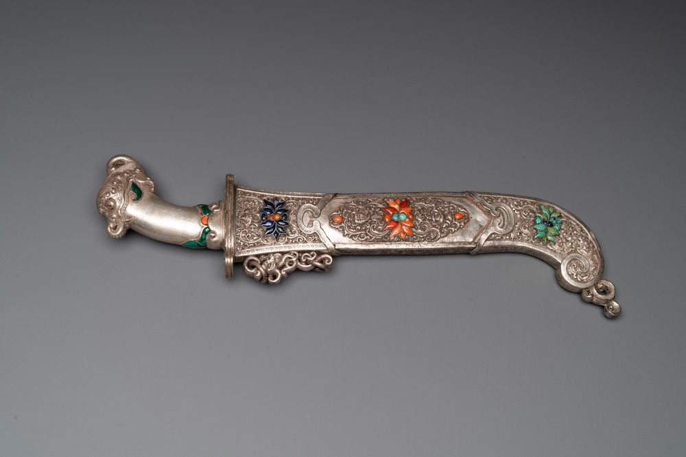 A large Tibetan coral- and precious stone-inlaid silver dagger, 19th C.