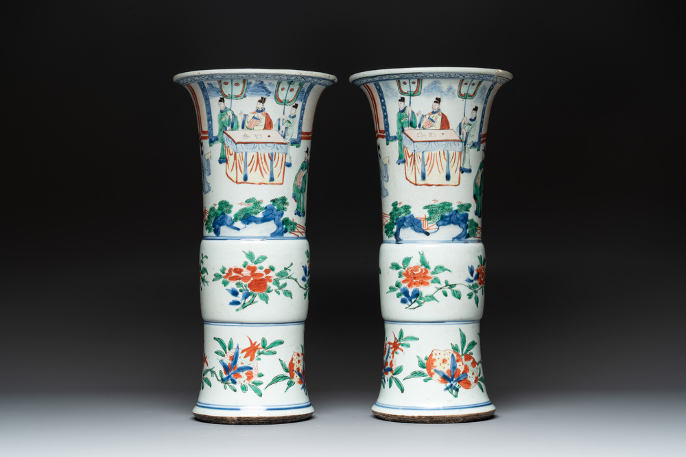 A pair of Chinese wucai 'gu' vases with narrative design, Transitional period