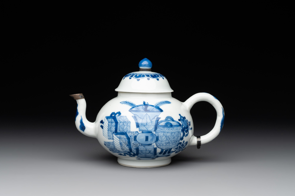 A Chinese blue and white 'antiquities' teapot, Jiajing mark, Kangxi