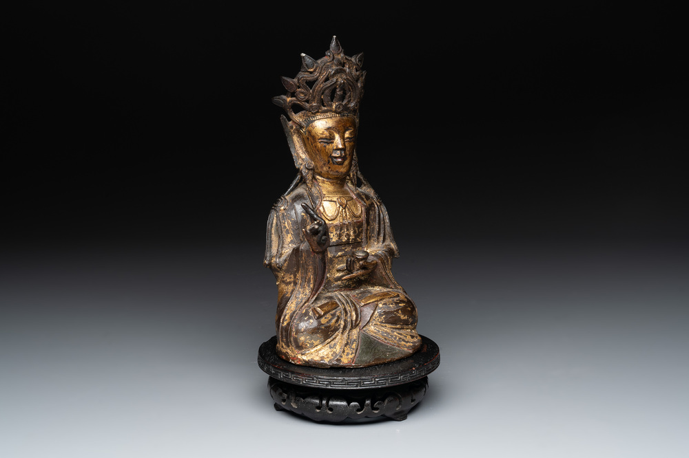 A Chinese parcel-gilt bronze Guanyin, Ming