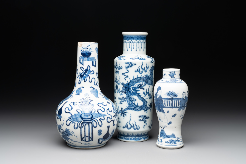 Three Chinese blue and white vases with antiquities, dragons and figures, 19th C.