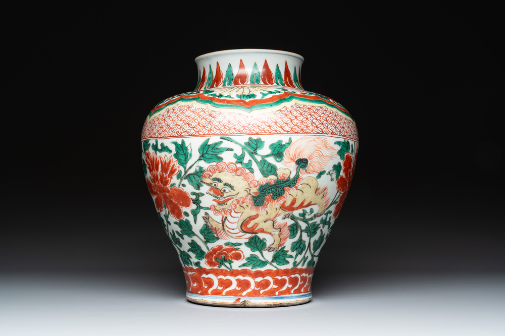 A Chinese wucai 'Buddhist lion and peony scroll' vase, Transitional period