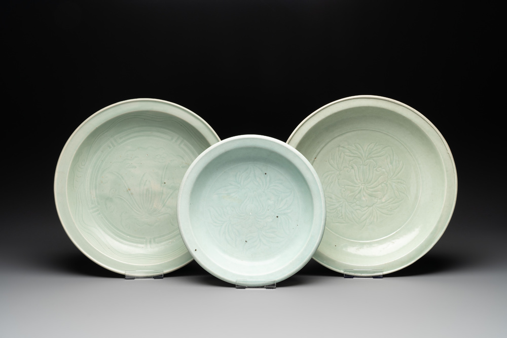 Three Chinese celadon dishes with floral design, Ming and later