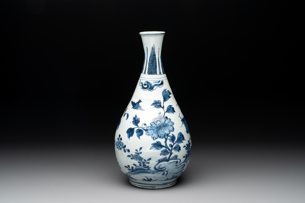 A Chinese blue and white 'birds among flowering branches' bottle vase, Ming