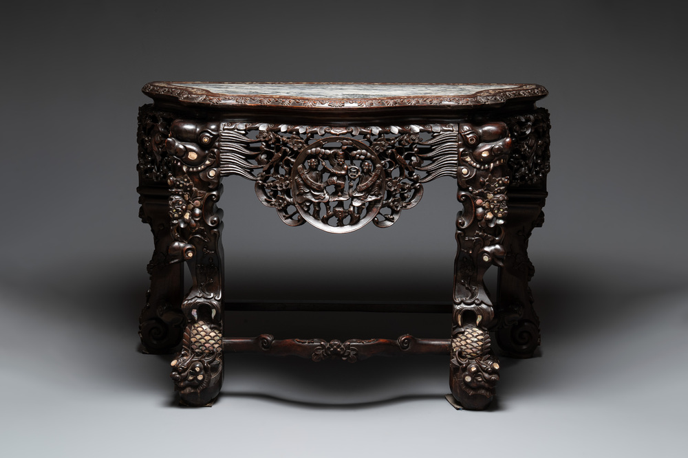 A finely carved Chinese hongmu console table with marble top and mother-of-pearl inlay, Canton, 19th C.