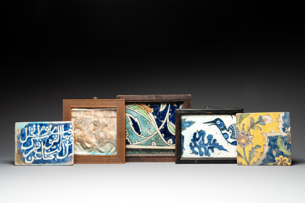 Five Islamic and Persian pottery tiles, 14/19th C.