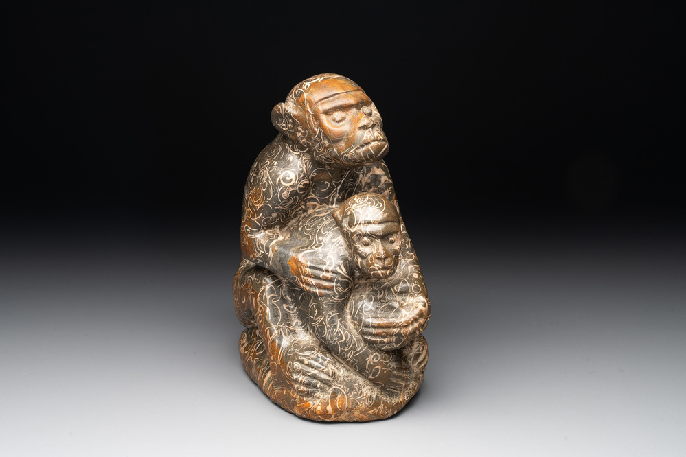 A Chinese stone group of two monkeys, 20th C.