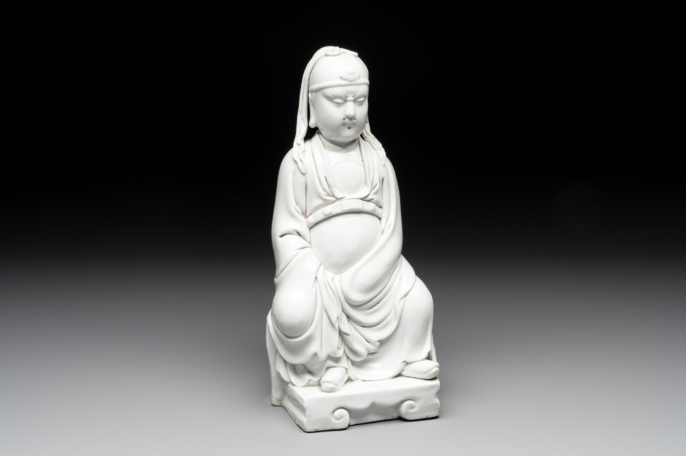 A Chinese Dehua blanc de Chine figure of Wenchang, 20th C.
