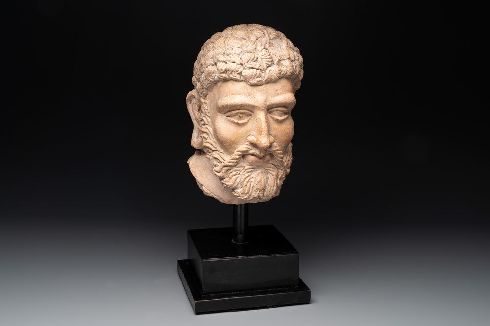 A large terracotta head of a bearded man, Gandhara region, Kushan period, 4/5th C.