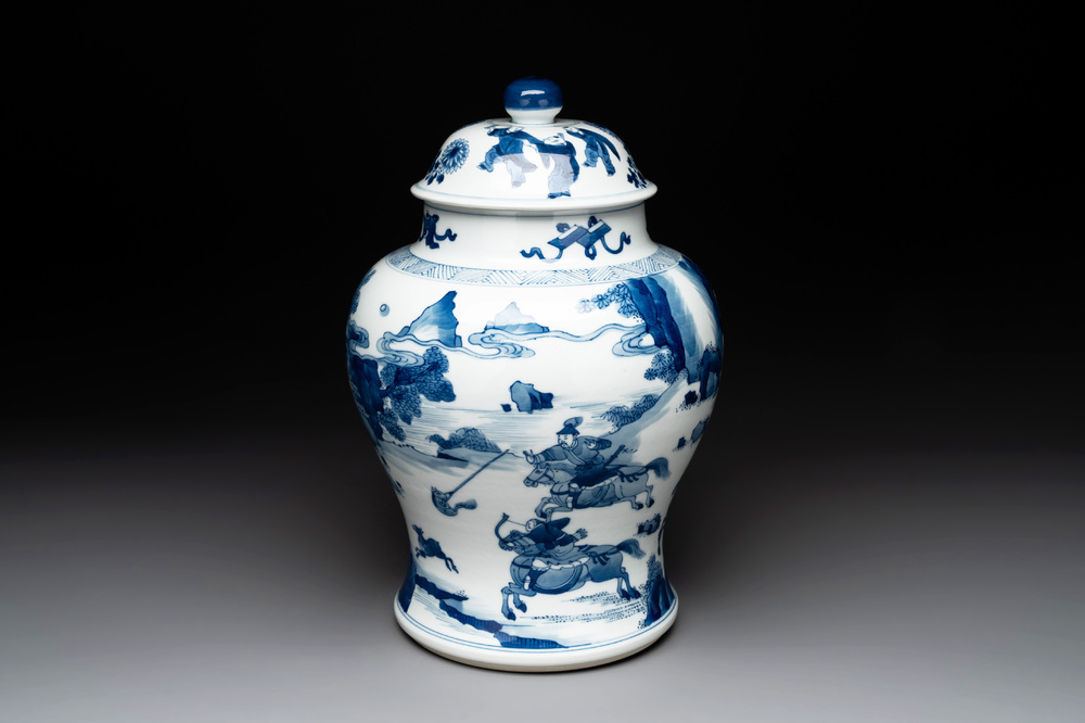 A Chinese blue and white 'Mongolian hunt' vase and cover, Kangxi