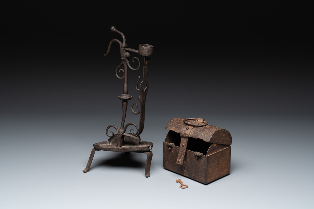 A wrought iron candle holder and a casket, possibly France and Nuremberg, 16/18th C.