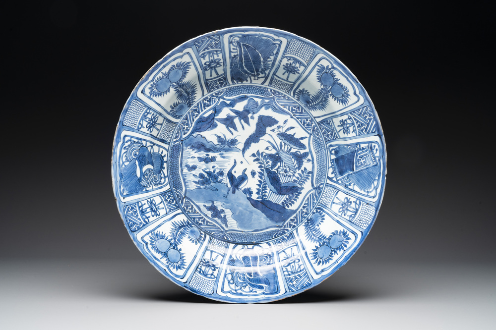 A large Chinese blue and white 'kraak' dish with geese among lotus flowers, Wanli