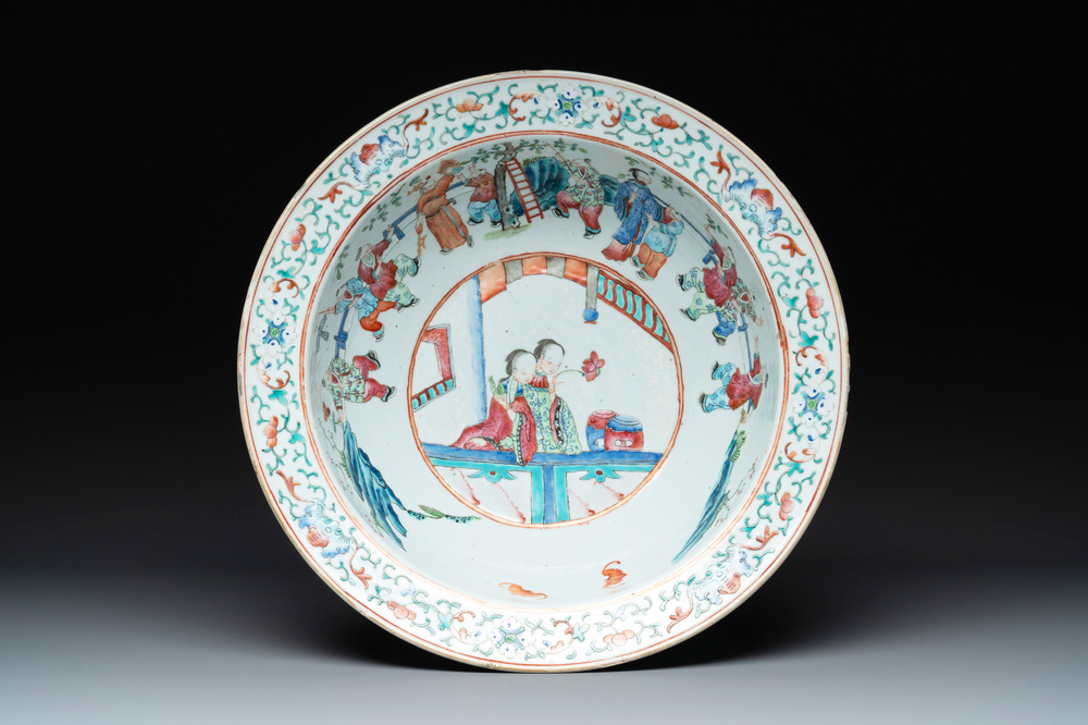 A Chinese famille rose 'ladies and playing boys' basin, 19th C.