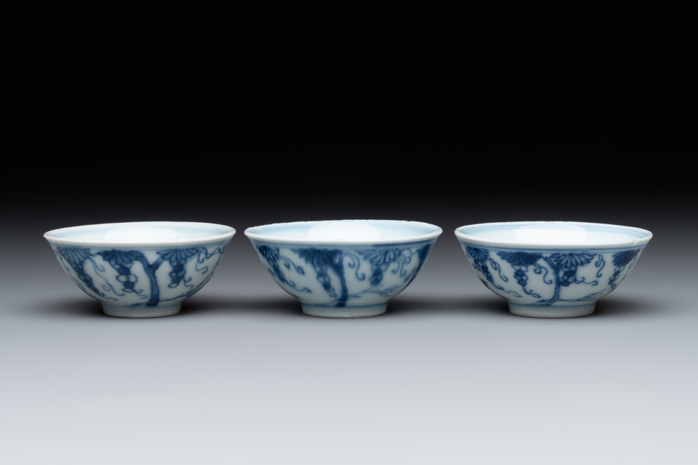 Three Chinese blue and white 'grapevines' cups, Yongzheng mark and of the period