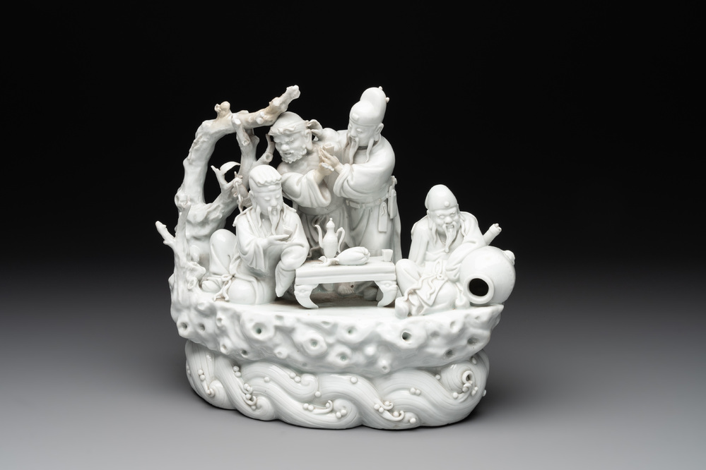 A Chinese Dehua blanc de Chine group of four deities on a boat, Republic