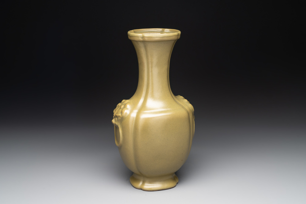 A Chinese teadust-glazed 'hu' vase with 'taotie' design, 19/20th C.