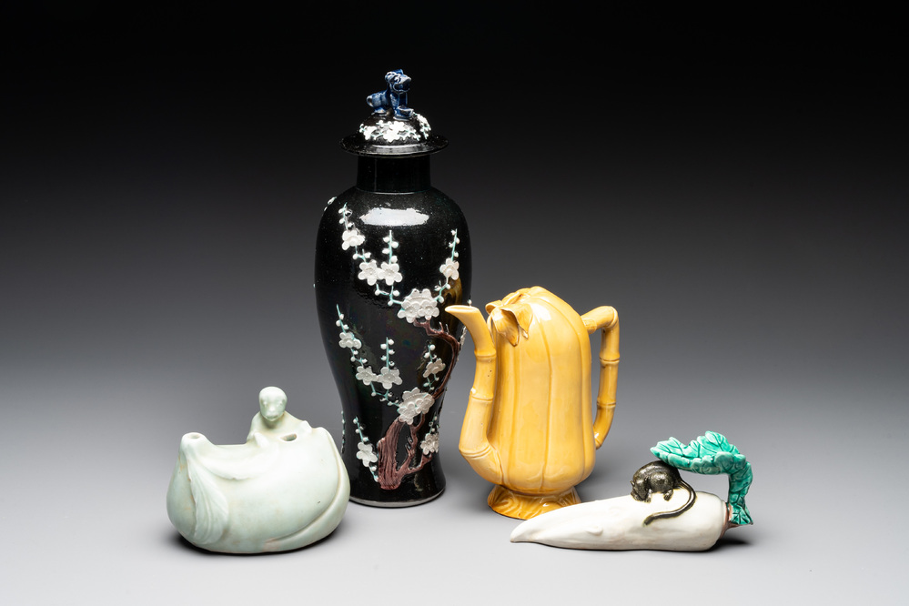 A Chinese celadon-glazed water dropper, a yellow-glazed ewer, a famille noire covered vase and a miniature model, 19th C.