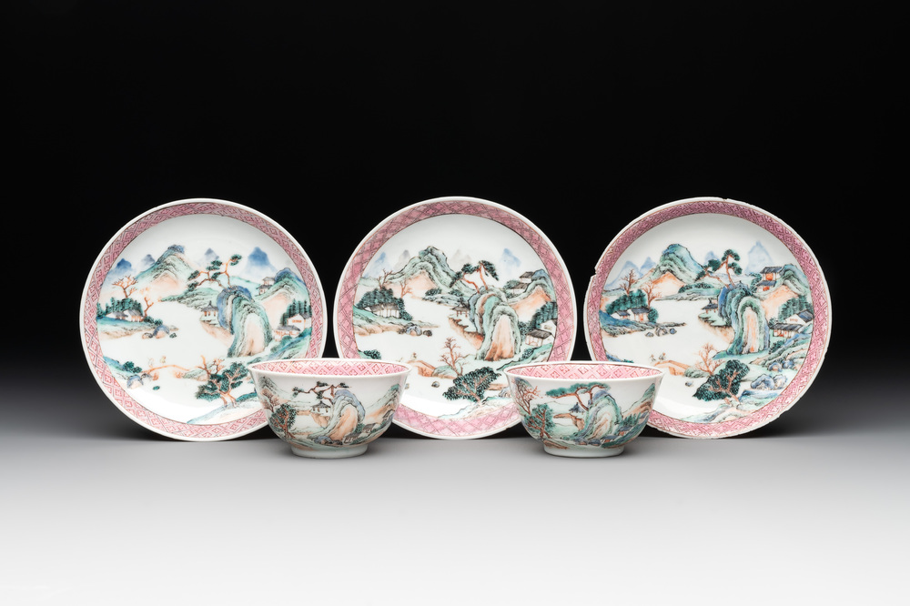 Two Chinese famille rose cups and three saucers with a fine landscape design, Yongzheng/Qianlong