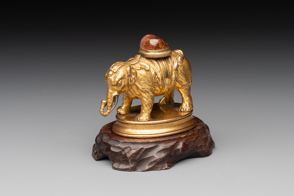 A Chinese pink quartz-inset gilt bronze elephant, 18th C.