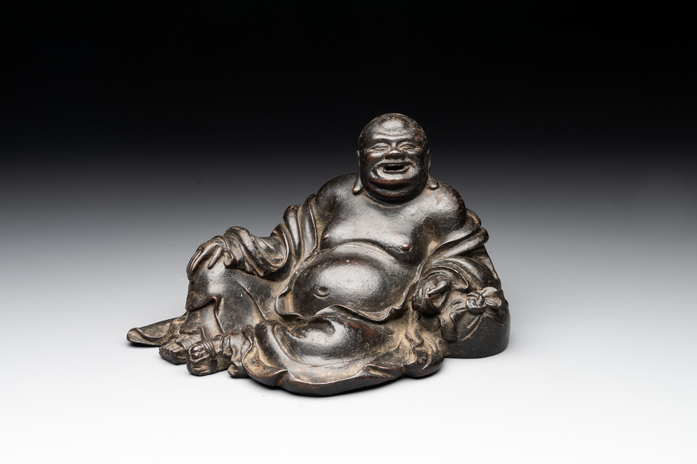 A Chinese bronze Budai, 17th C.