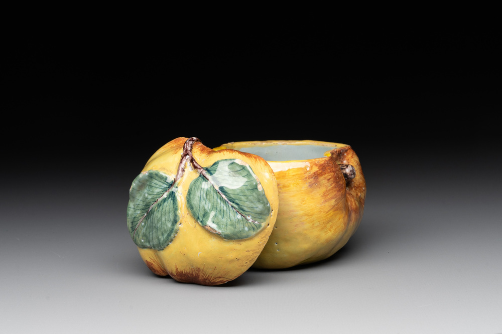 A polychrome Dutch Delft apple-form box and cover, 18th C.