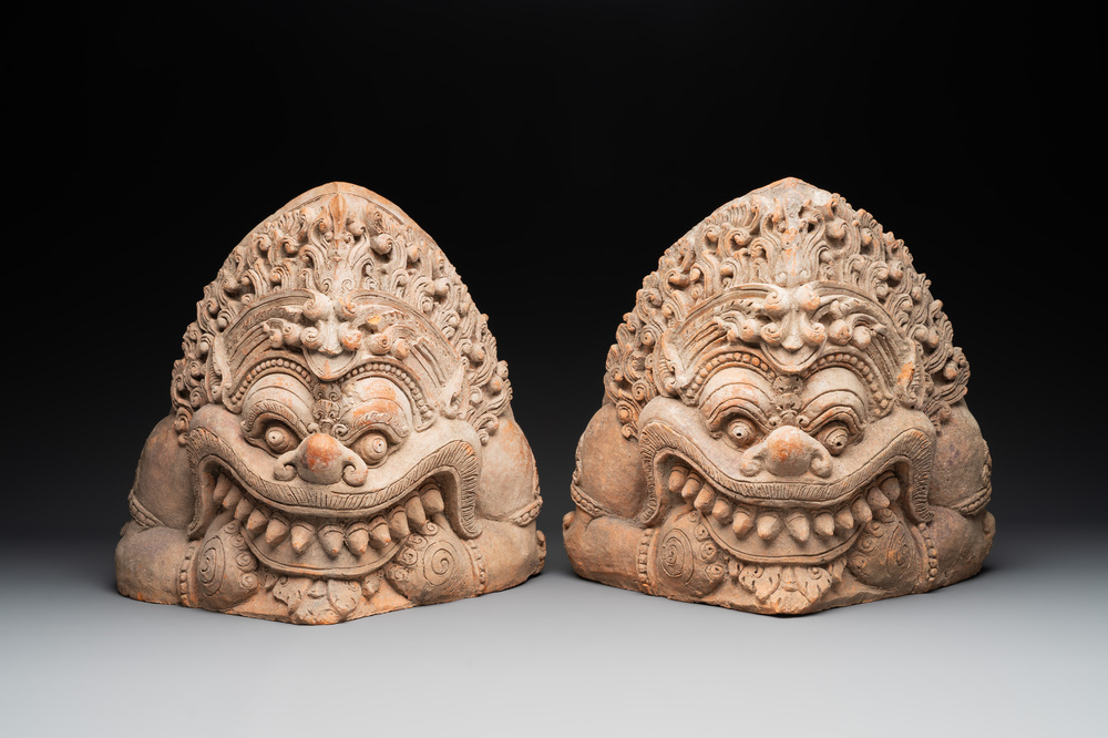 A pair of Cambodian terracotta architectural ornaments depicting Kala, late Khmer period