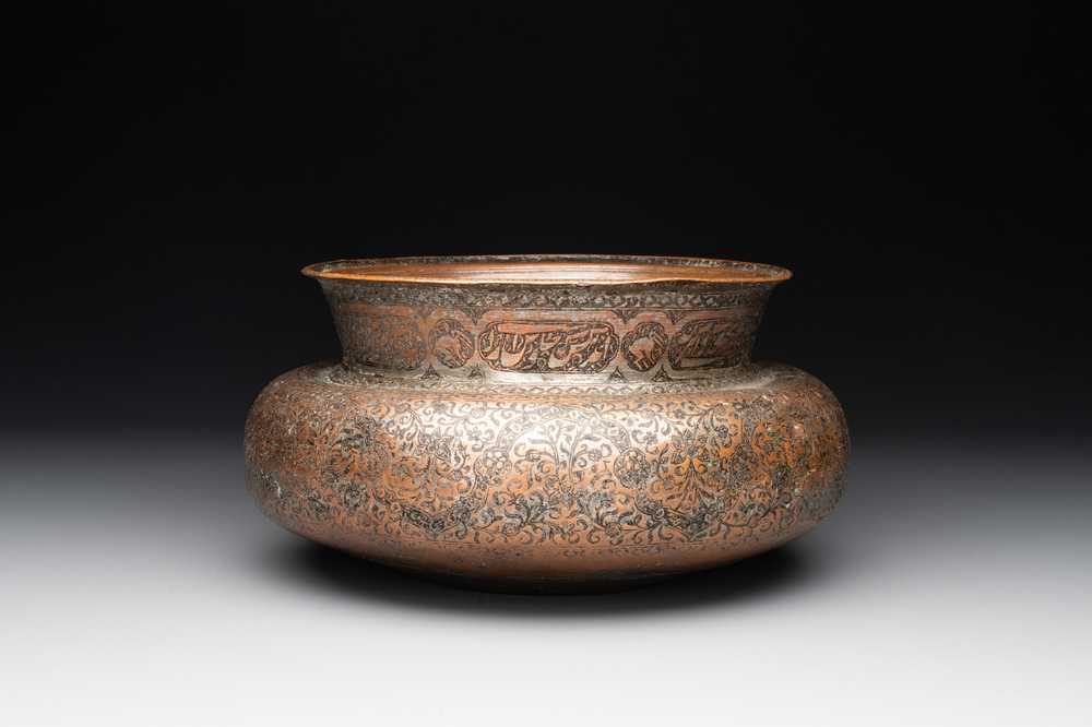 A tinned and black-enamelled copper basin, Iran, Safavid, 17th C.