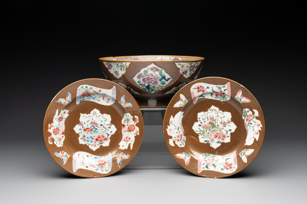 A Chinese famille rose capucin-brown-ground bowl and two plates, Qianlong