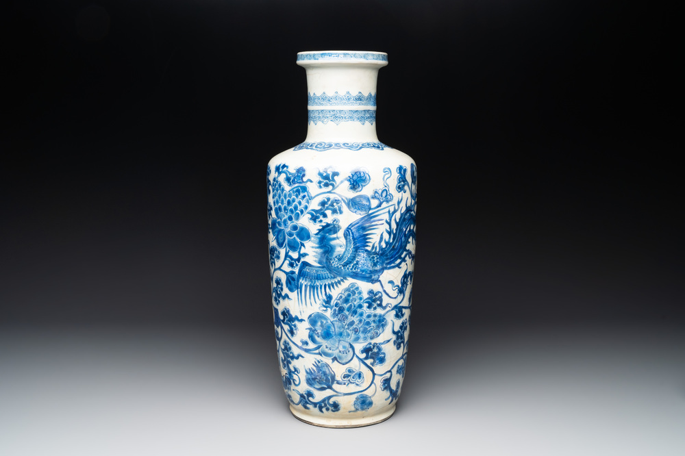 A Chinese blue and white 'phoenix and peony scroll' rouleau vase, Kangxi