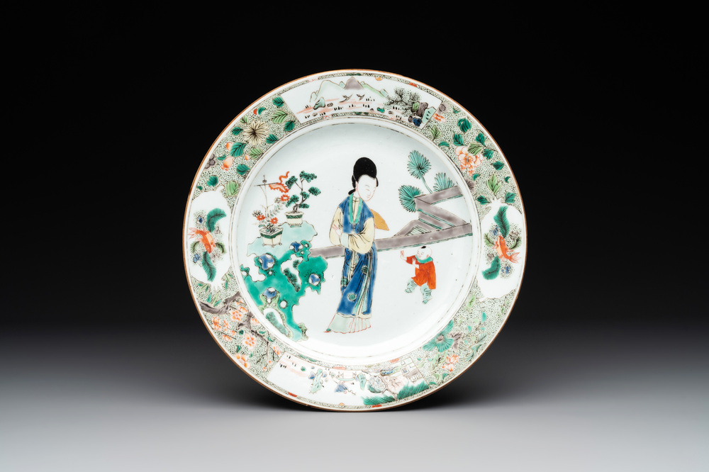A Chinese famille verte 'lady and playing boy' plate, Kangxi